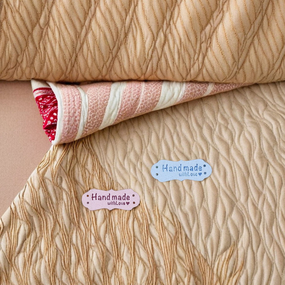 Sewing Labels - 100 stuks handgemaakte reliëf suède labels